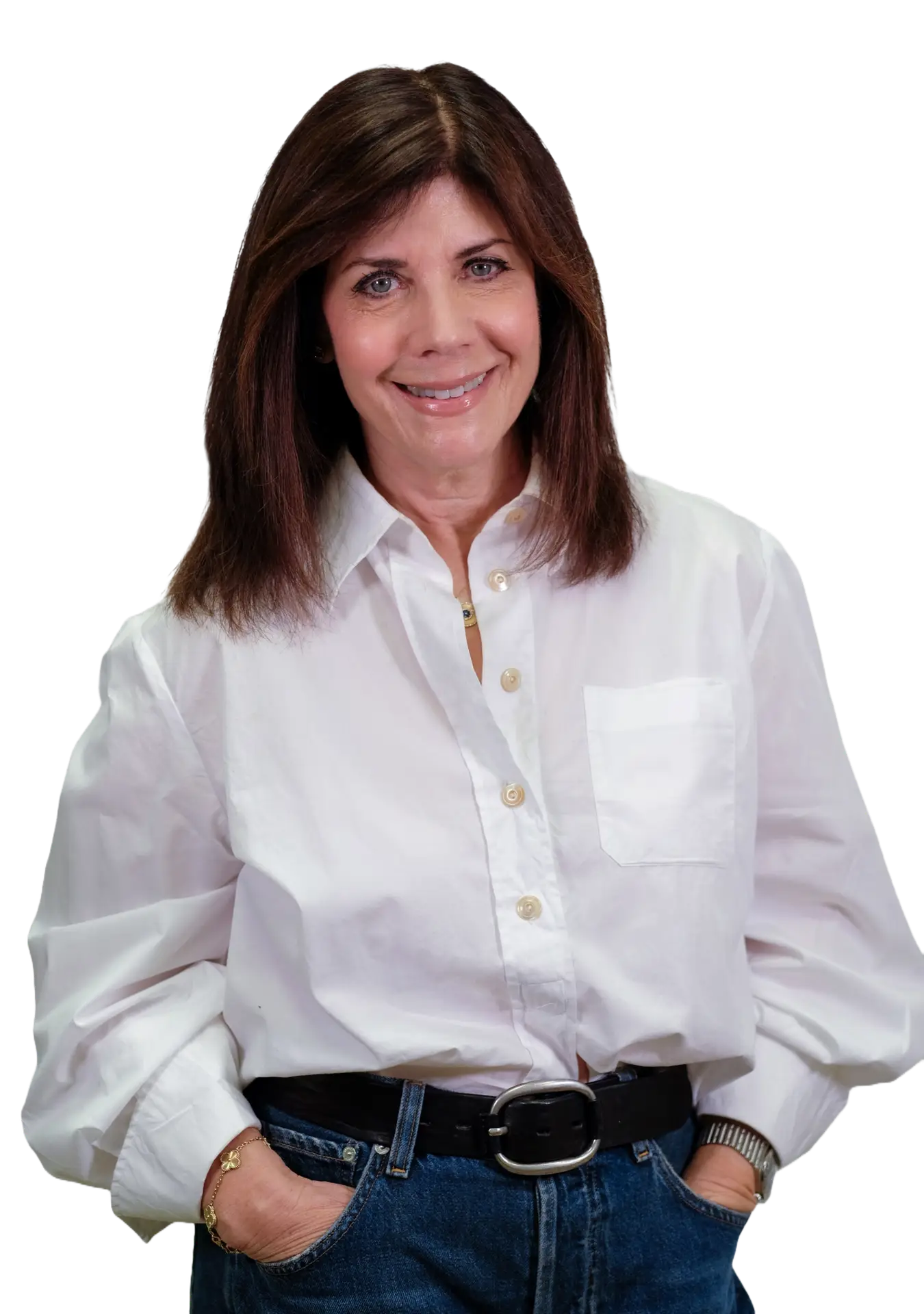 Headshot of Marla Plotnick. She is smiling and wearing a white long sleeves shirt with blue jeans. She was brown hair.