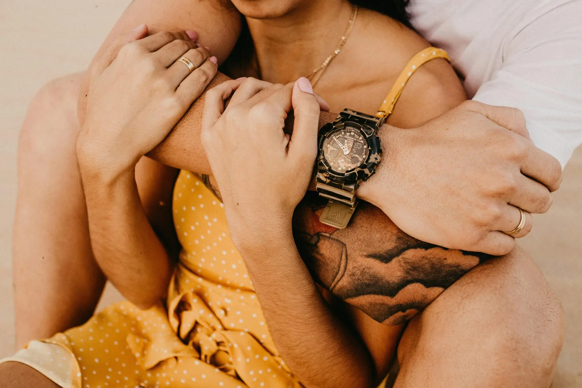 two people hugging each other