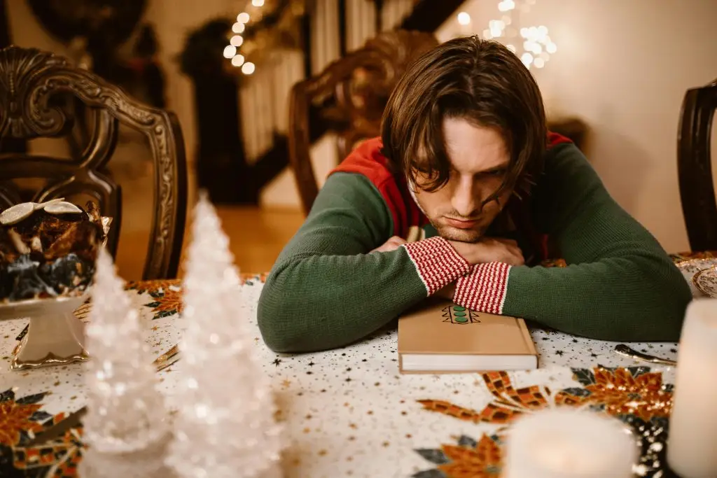 man spending the holiday season by himself